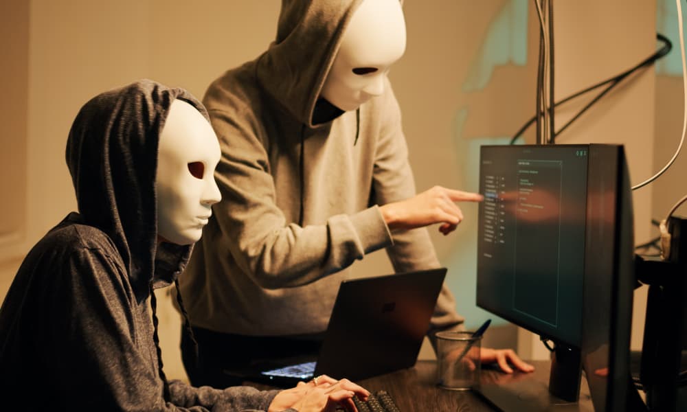 Two hackers try to compromise a company’s cybersecurity protection.