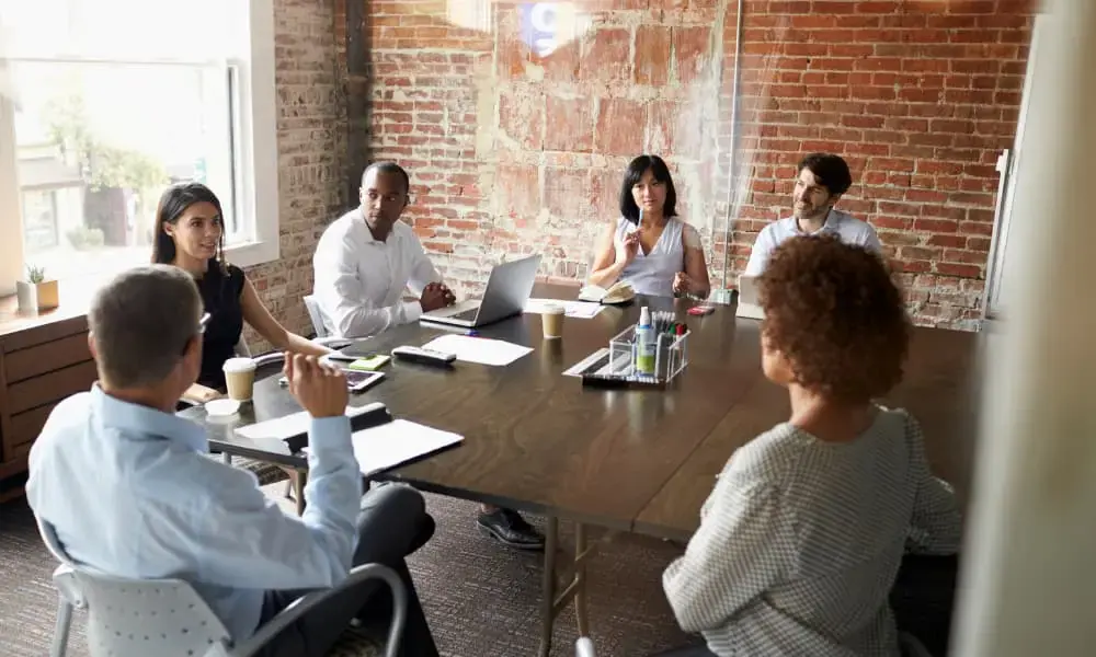 Business and technology teams meet for a quarterly I.T. strategy session