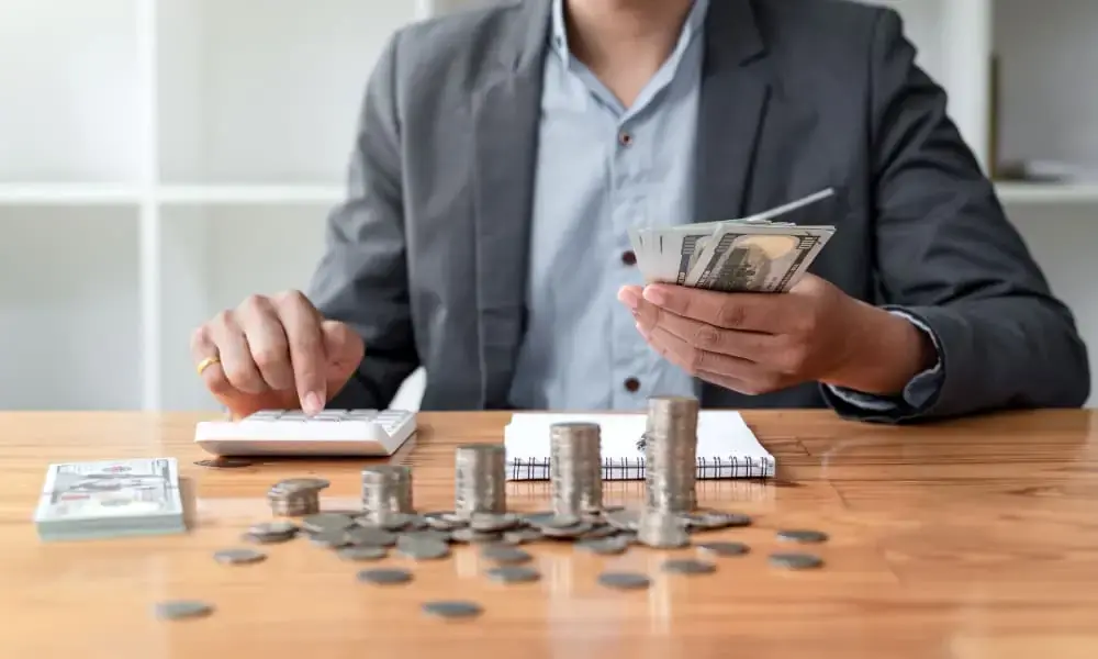 A business owner counts dollars saved through an I.T. infrastructure optimization which helped him reduce business I.T. costs.