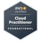 The image is a badge for AWS certification. It contains the text "aws certified" with an orange checkmark logo at the top. Below that, it says "Cloud Practitioner" and "FOUNDATIONAL" on a dark hexagonal background.